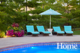 Chaises offer spots to relax. Photo by Jack Coyier, courtesy of Ted Lare Design + Build. Chaises and potted plants by the pool's edge