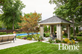 A reconfigured gazebo takes center stage in this part of the landscape. With screens removed, it becomes an open-air structure. A ceiling fan keeps the air moving in a spot that is great for morning coffee or afternoon or evening wine.