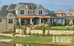 A graceful property sits on the banks of a pond south of Norwalk.