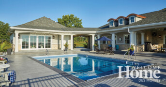 The in-ground pool is a welcoming touch for family and friends.
