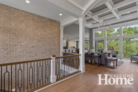 The front door entryway is embellished with archway detailing and a magnificent ceiling that draws your eyes upward.