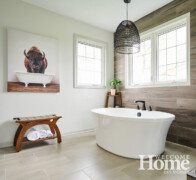 The Wetzells hung artwork in the master bath as a nod to the room's inspiration, the master bath in the "buffalo house".