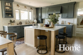 Morris Lare created a unique island design that offers storage, casual dining, and additional work surface without overwhelming the space.