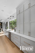 Ample cabinetry in Irish Cream and Cherry Cappuccino add visual warmth.