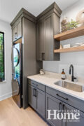 Wherever possible, the trees enter the background, even in the main floor laundry room.