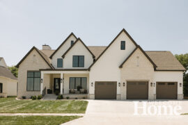The home's exterior is full of transitional style featuring natural finishes.