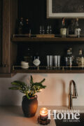 The convenient butler's pantry provides plenty of space for a bar.